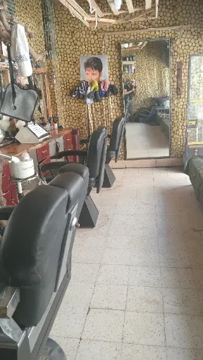 شعار صالون معاذ صلوع